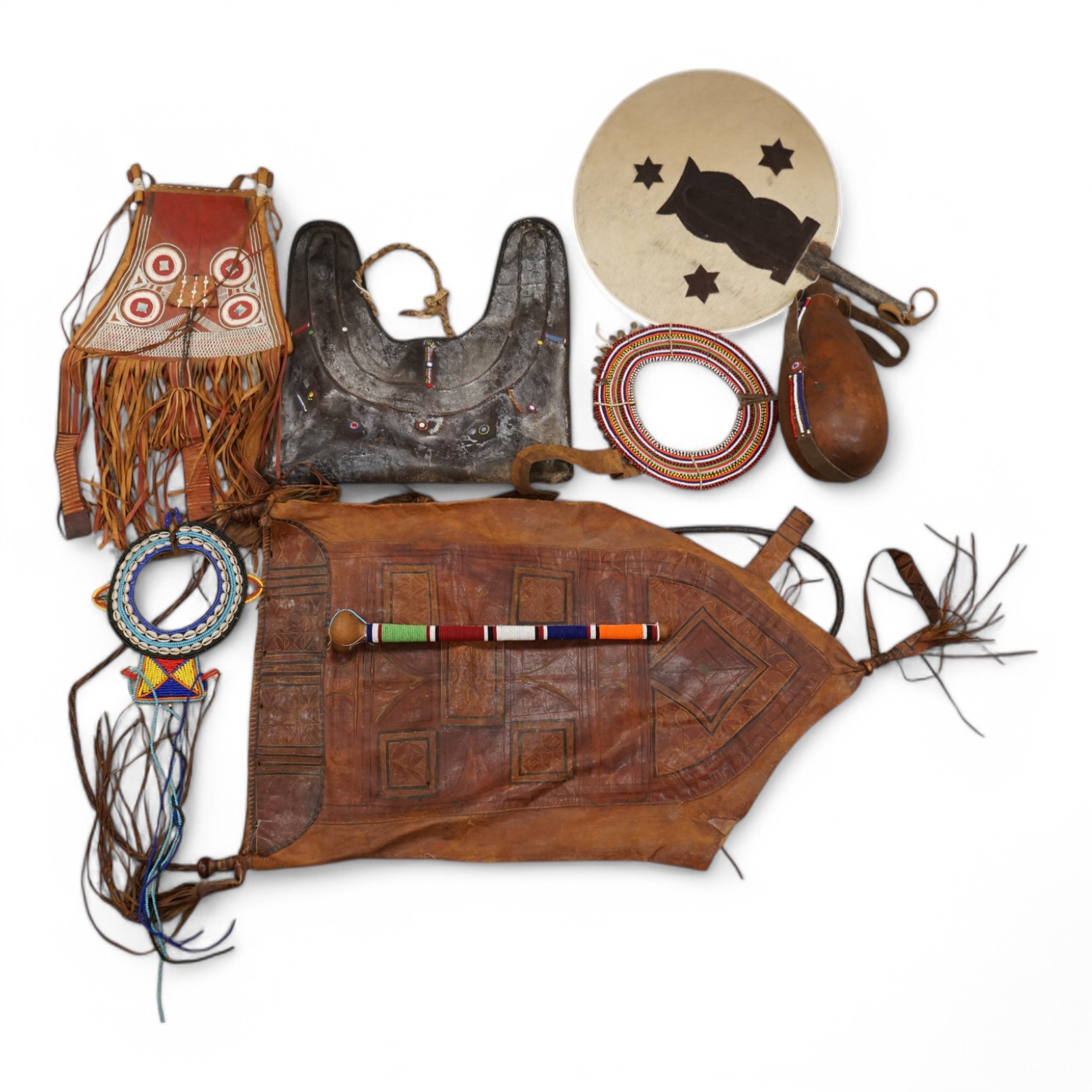 A collection of tribal leather bags and African beadwork items to include water flask and necklaces. Condition - mostly fair